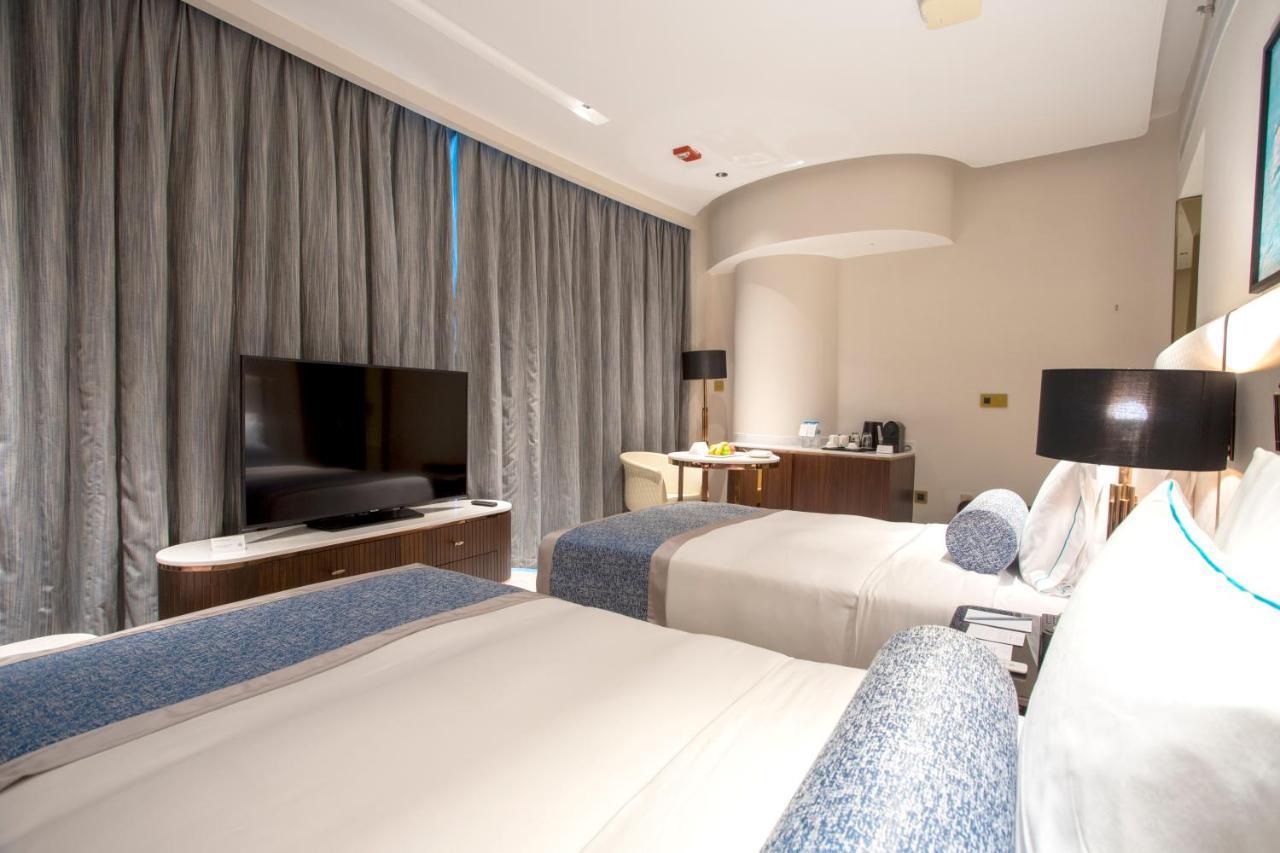 Century Marina Hotel - Lusail Exteriör bild Deluxe Room