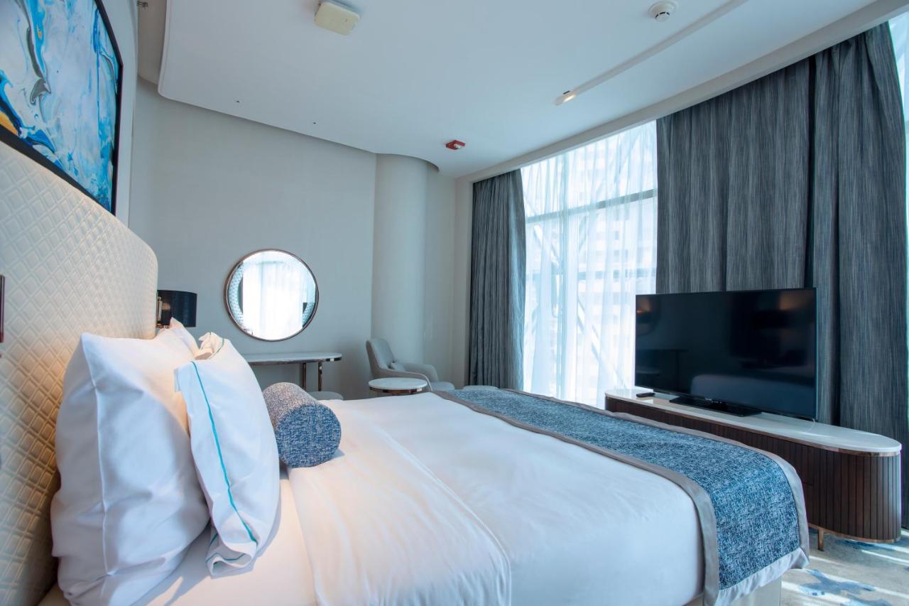 Century Marina Hotel - Lusail Exteriör bild A bedroom at the hotel