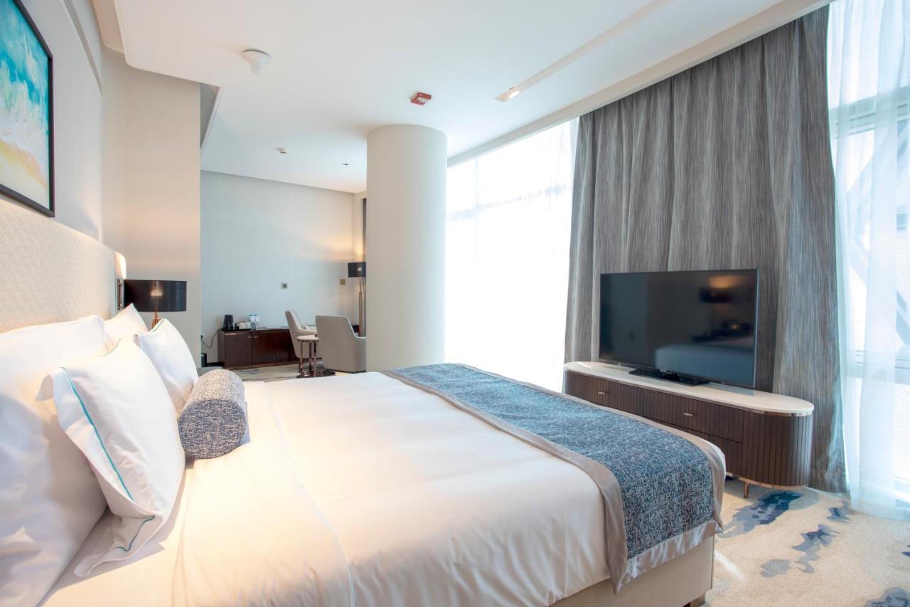 Century Marina Hotel - Lusail Exteriör bild A bedroom at the hotel