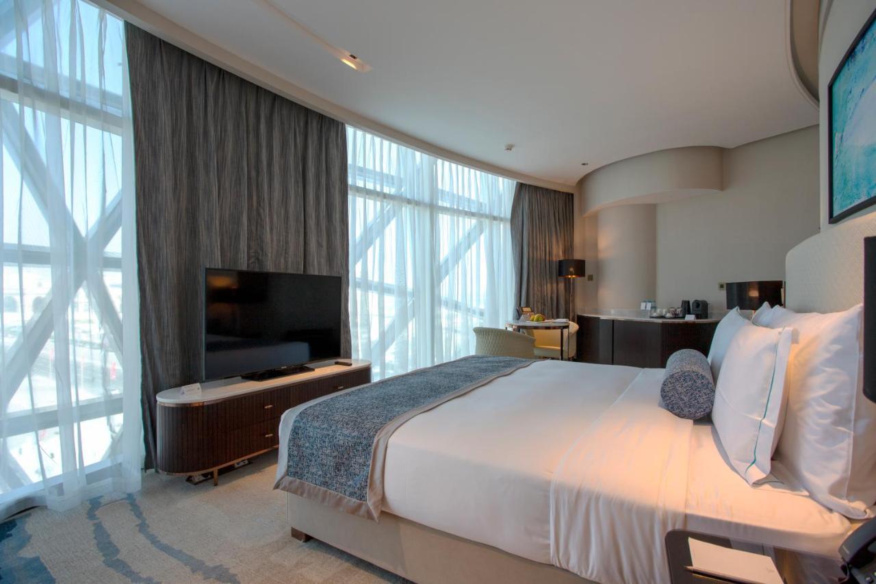 Century Marina Hotel - Lusail Exteriör bild A bedroom at the hotel