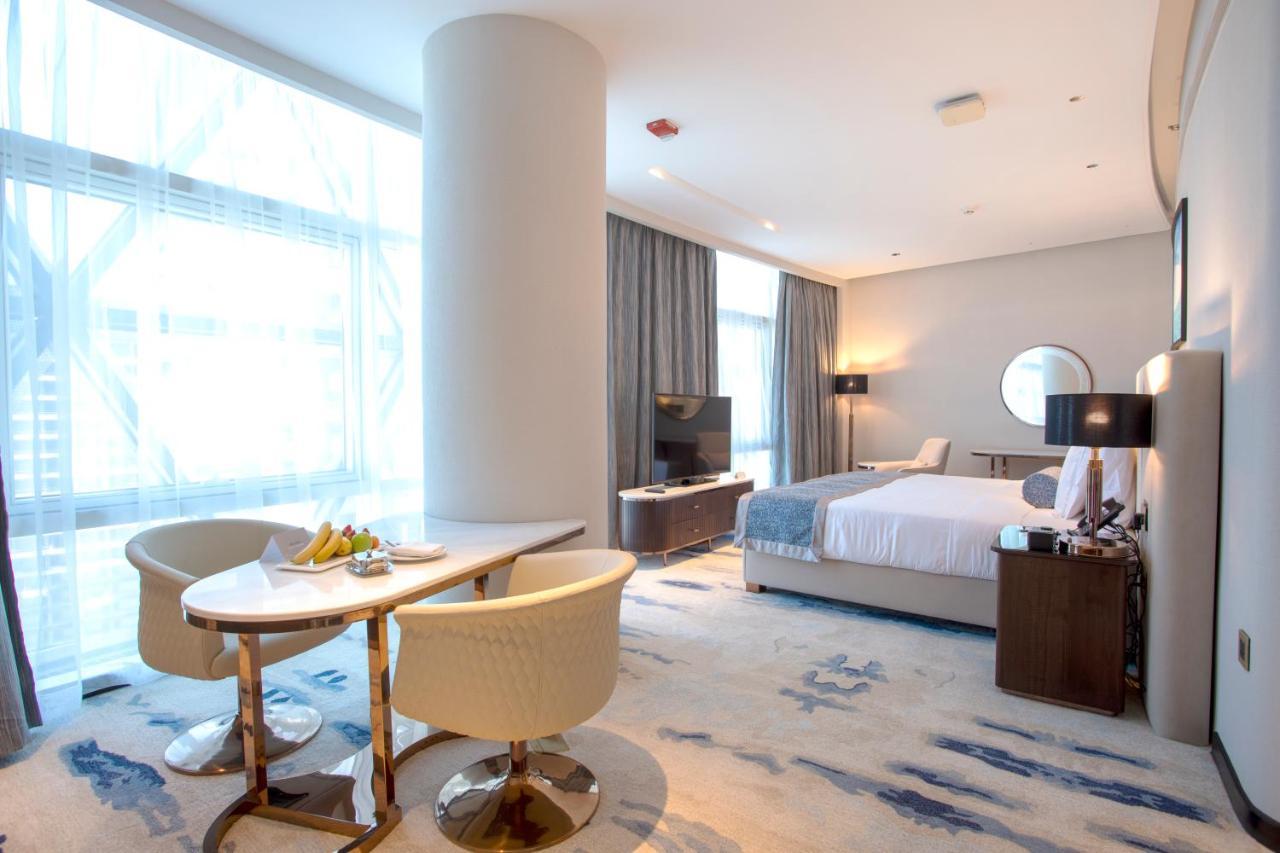 Century Marina Hotel - Lusail Exteriör bild A suite at the hotel