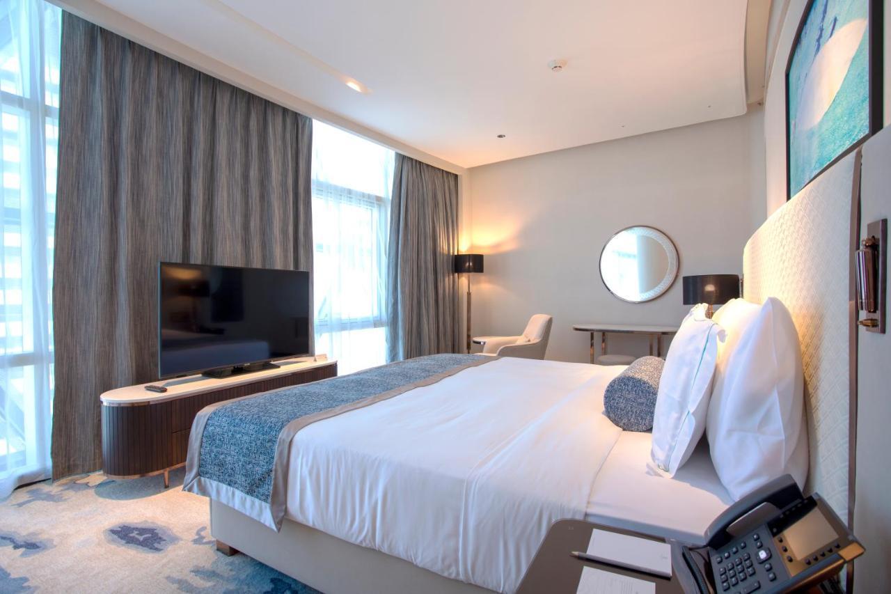 Century Marina Hotel - Lusail Exteriör bild A bedroom at the hotel