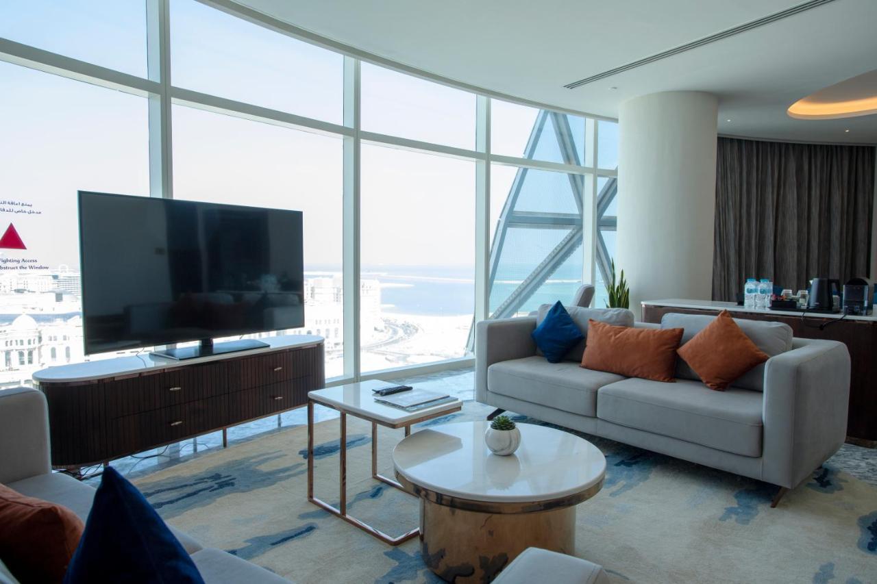 Century Marina Hotel - Lusail Exteriör bild A living room in a suite at the hotel